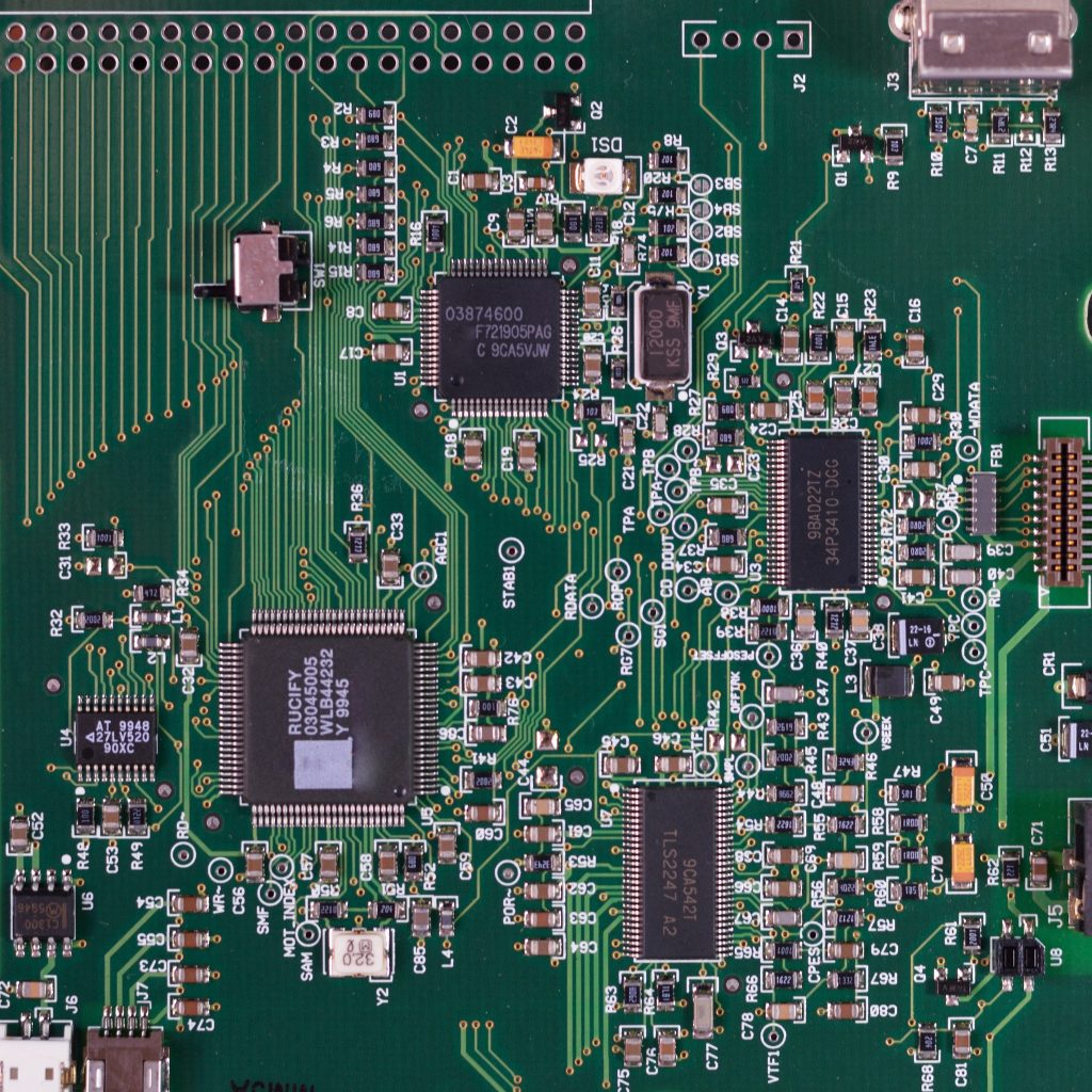 Closeup top view of green circuit board