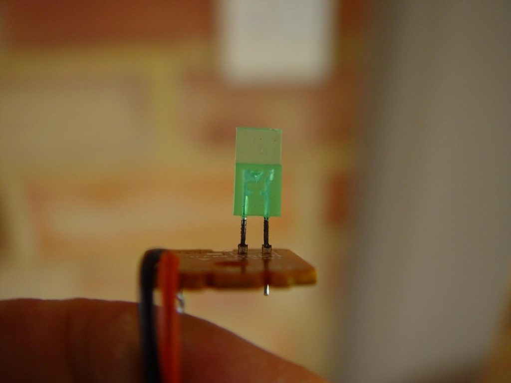 Green LED on orange circuit board